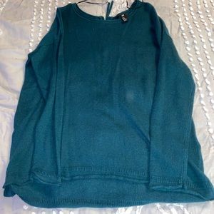 Green H&M sweater with zipper on back